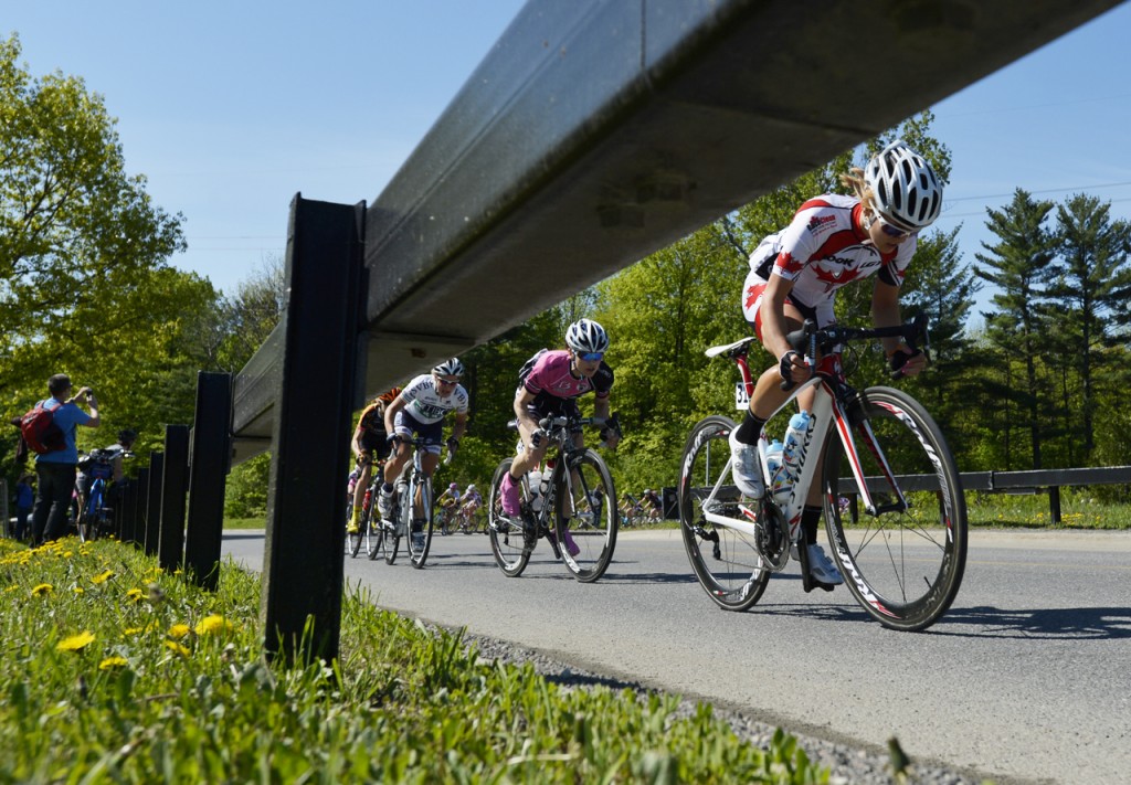 The peloton winds its way along the course of the Grand Prix Cycliste Gatineau.