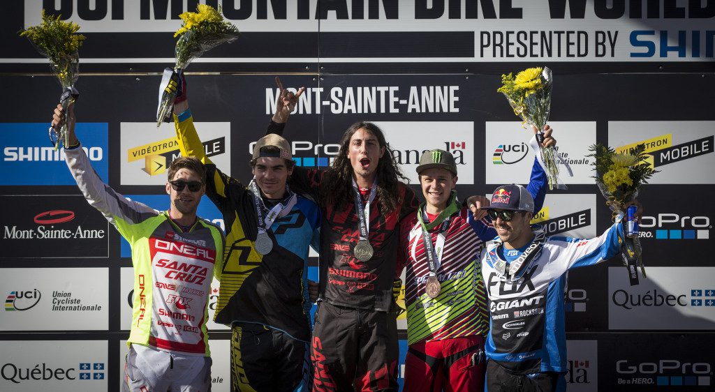 Men's podium at the 2015 mountain bike World Cup downhill at Mont Sainte Anne, Quebec. (Photo: Mathieu Bélanger)