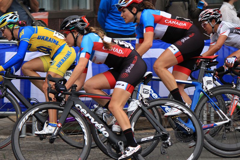 Canada's Karol-Ann Canuel (67) and Joelle Numainville (70) race in the 2015 UCI Road World Championships elite women's race Saturday in Richmond.