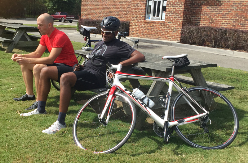 Two riders take a mid-day break during a ride on the Virginia Capital Trail.