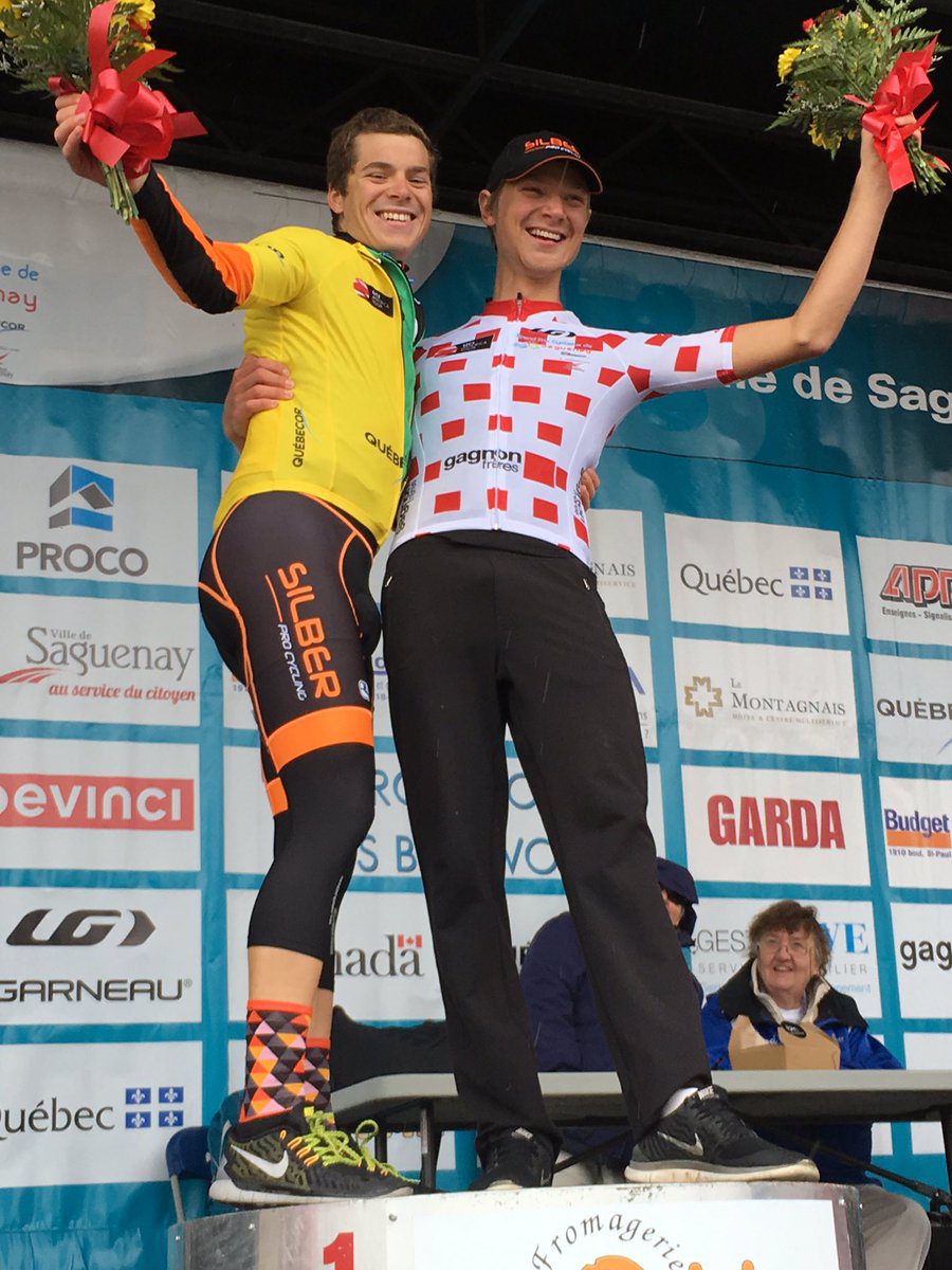 Cataford and Ben Perry celebrate on the podium after Stage 1 of the Grand Prix Cycliste de Saguenay. Photo credit: @GordFraser