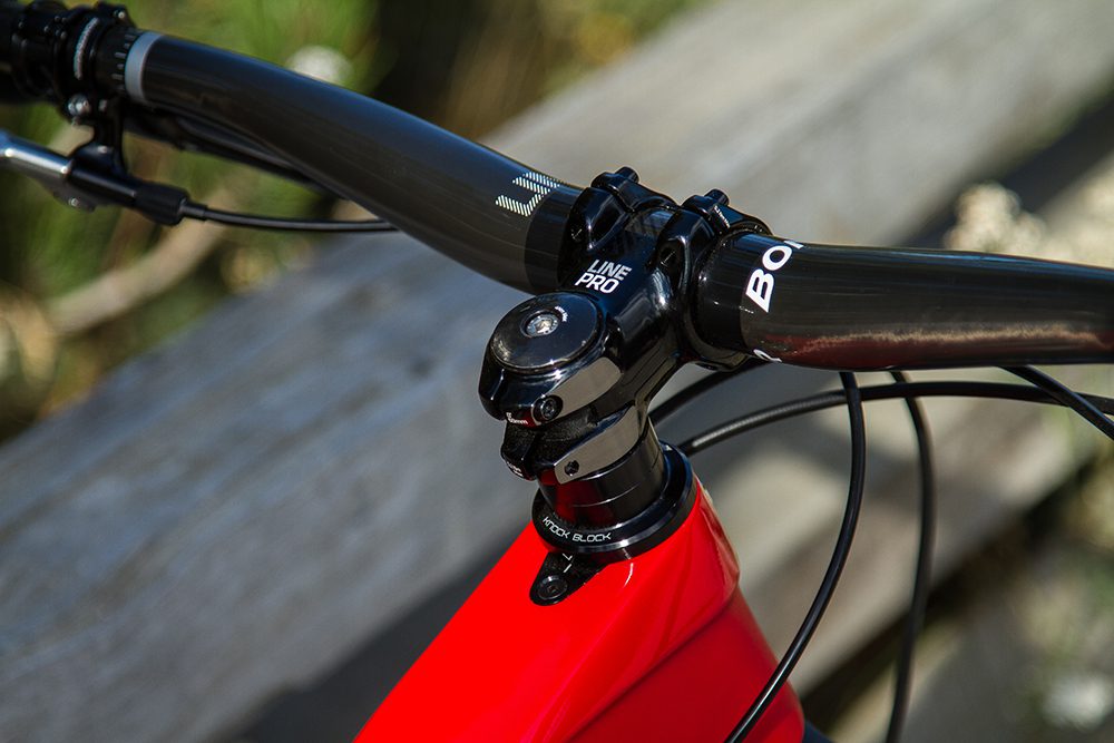 The Knock Block system, paired with the Line Pro stem. The stop chip screws into the top of the toptube, just behind the headset.