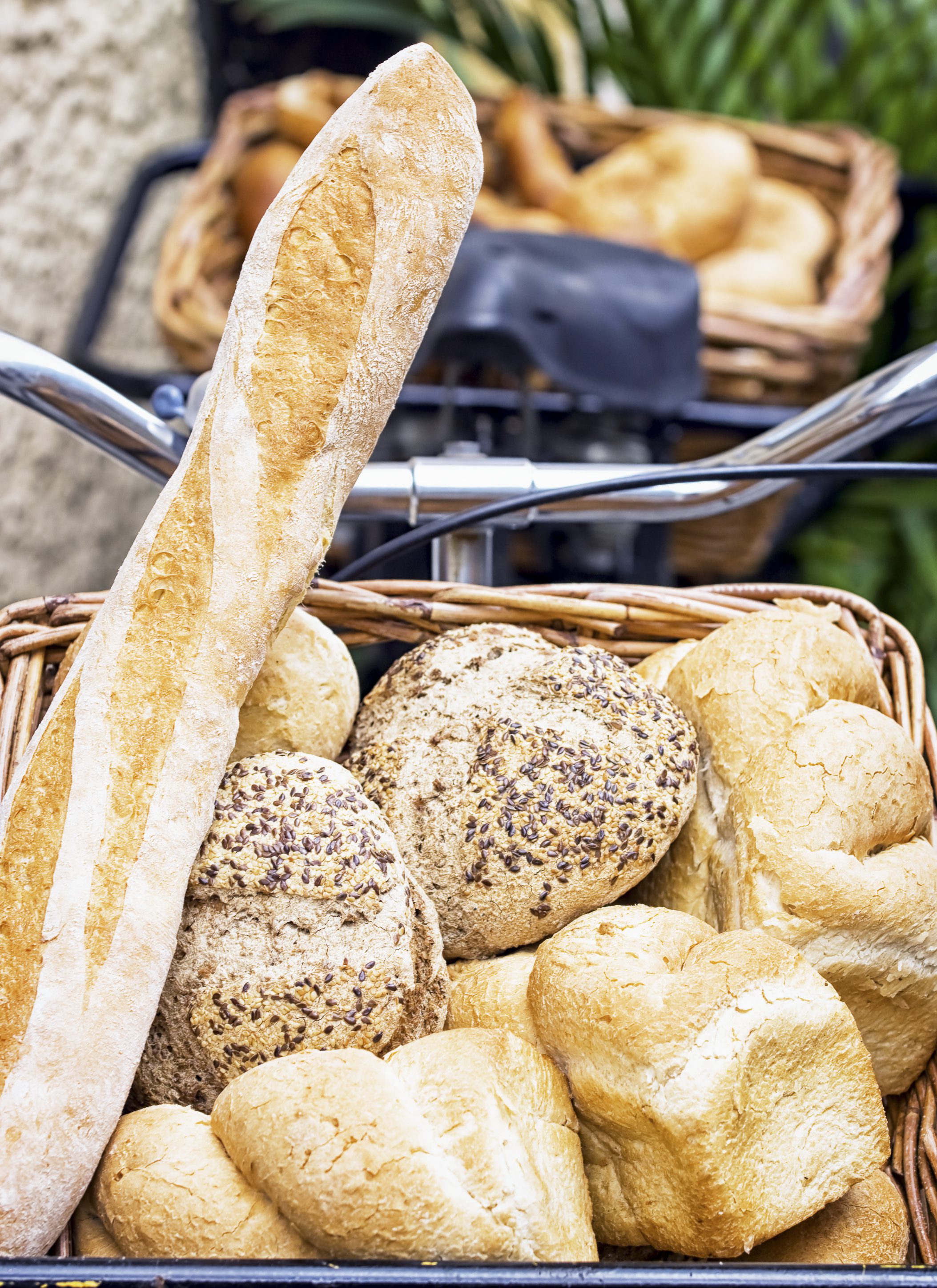 bread in a basket on a bike
