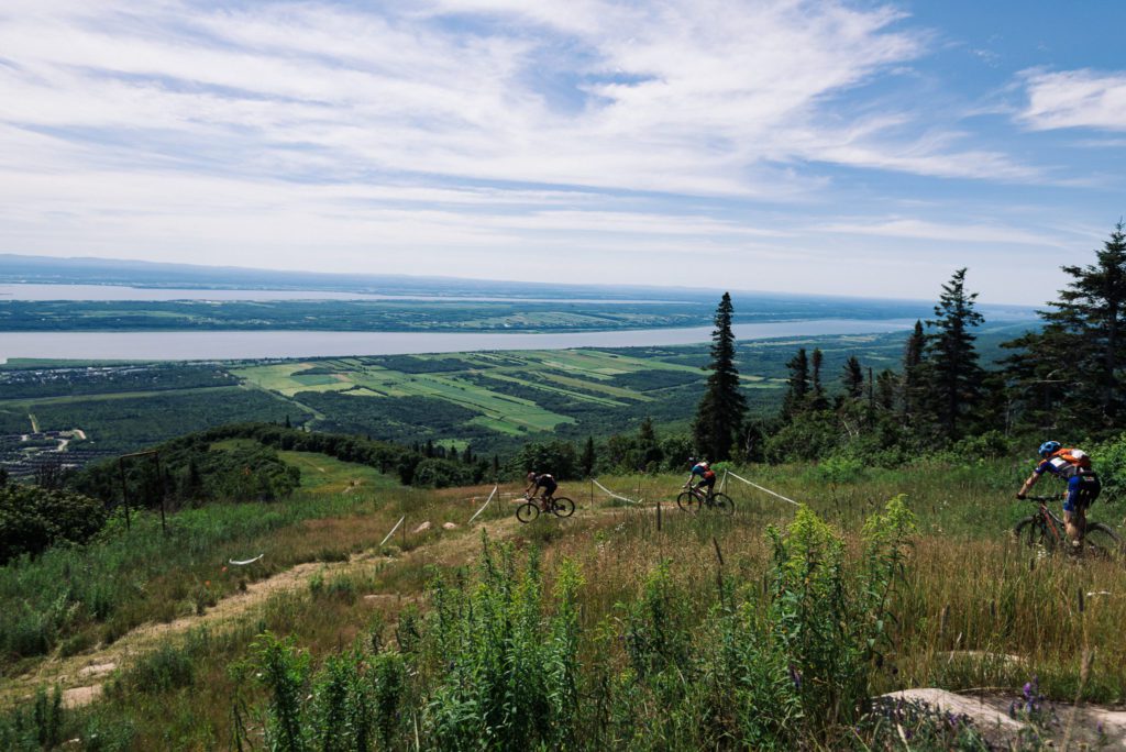Overlooking the St Lawrence River from the summit of Mont Sainte Anne, on day three of the Quebec Singletrack Experience. (Photo: Francis Fontaine/QSE)