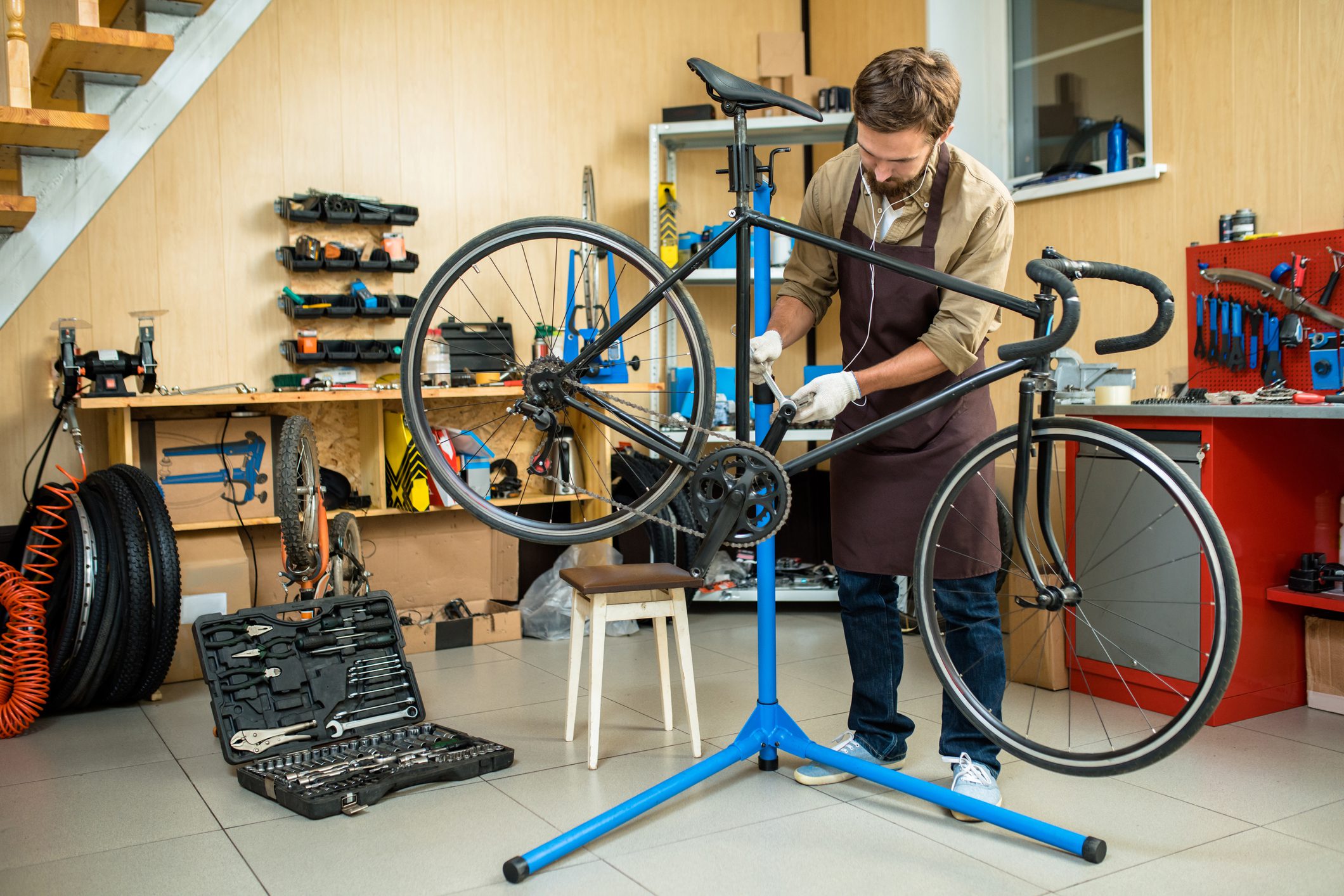 fixing a bike Fixing bike istock only - GettyImages 865880274