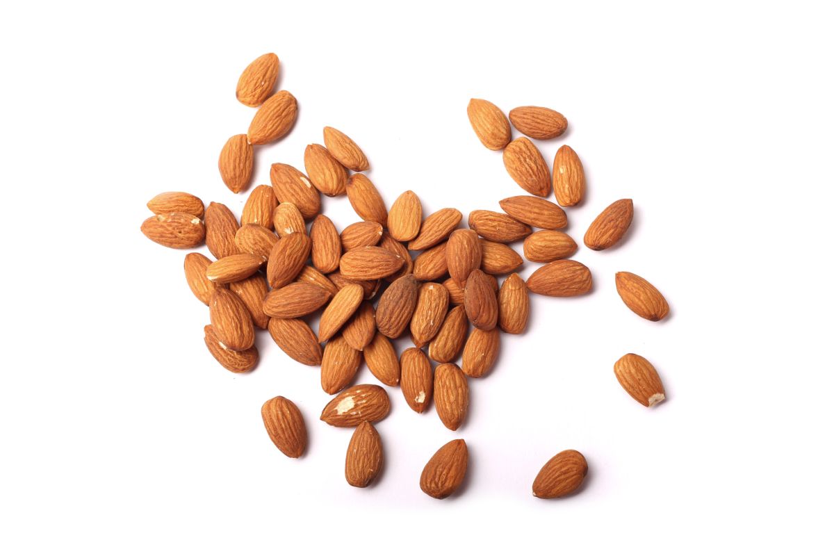 Group of almonds on a white background