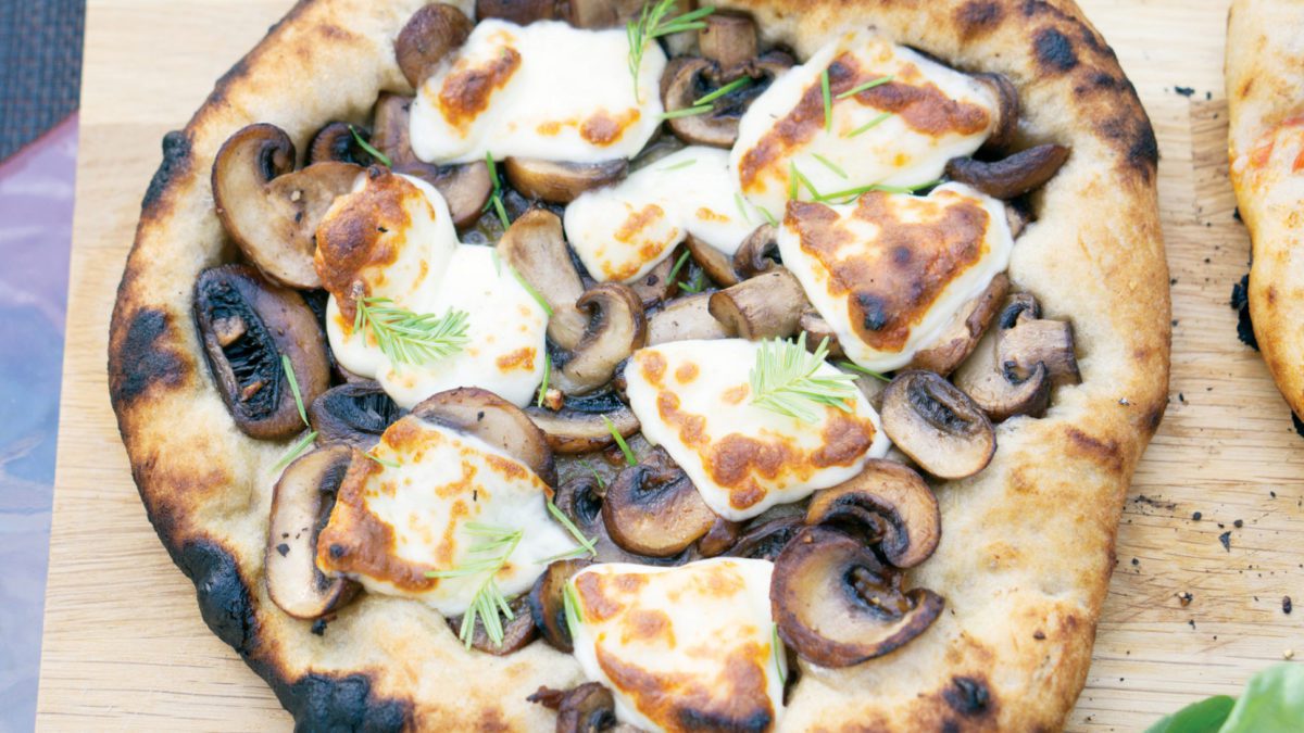 A mushroom and cheese pizza