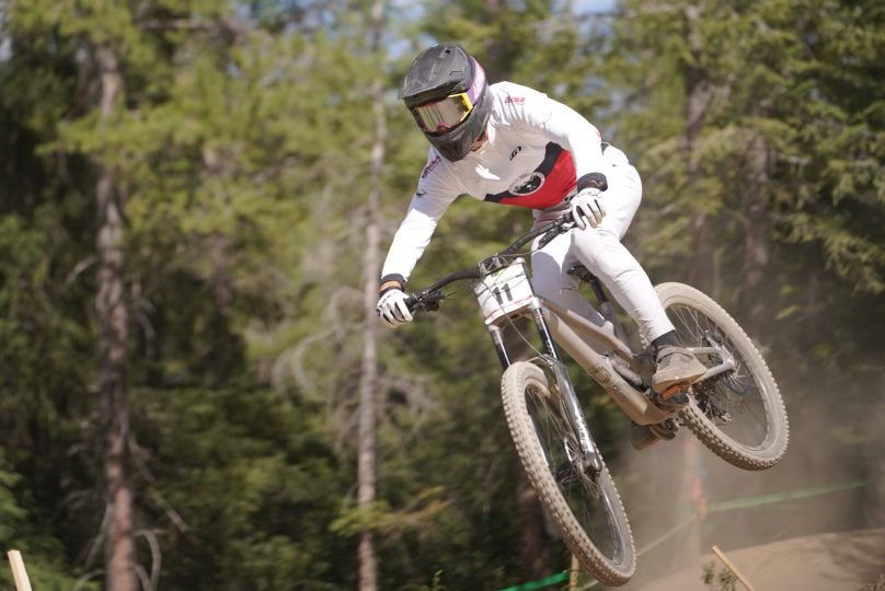 Jackson Frew jumps his mountain bike at a Canada Cup downhill event.