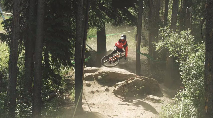 A rider jumps during a downhill mountain bike canada cup race at Panorama mountain resort
