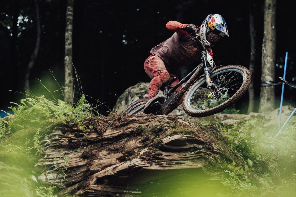 Finn Iles rides over a steep rock in Snowshoe, West Virginia 