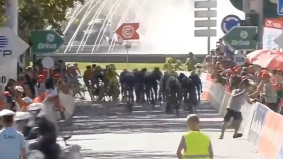 The sprint finish of the first stage of Tour of Portugal where a spectator almost gets hit