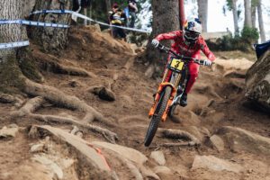 Myriam Nicole rides over roots in Val di Sole World Cup