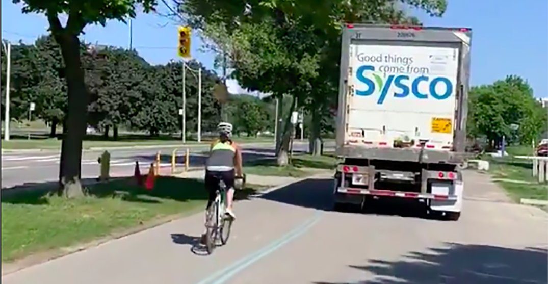 A truck parked illegally in a bike lane