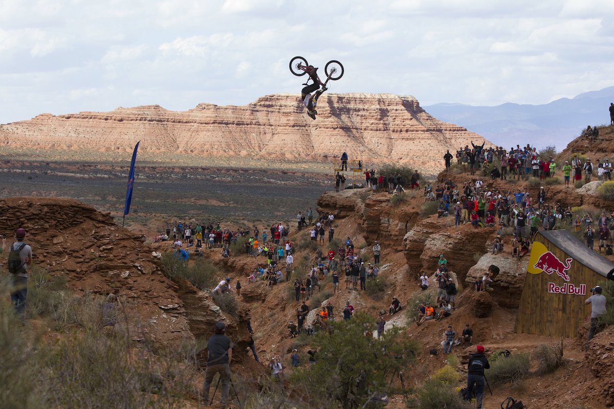 Kelly McGarry backflips over a Canyon during Red Bull Rampage