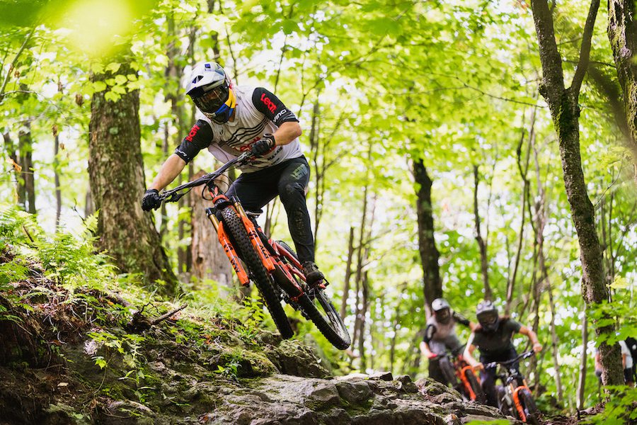 Greg Callaghan riding while filming Devinci Global Racing Eastern Townships