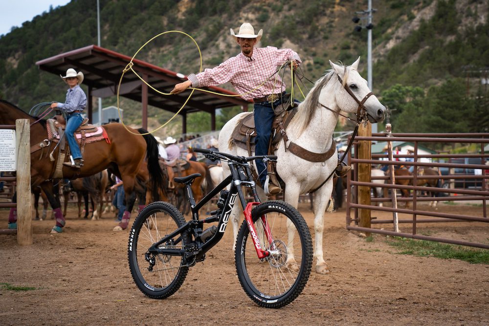 A man on a horse lassoo's the Revel Rodeo 3d-printed mountain bike