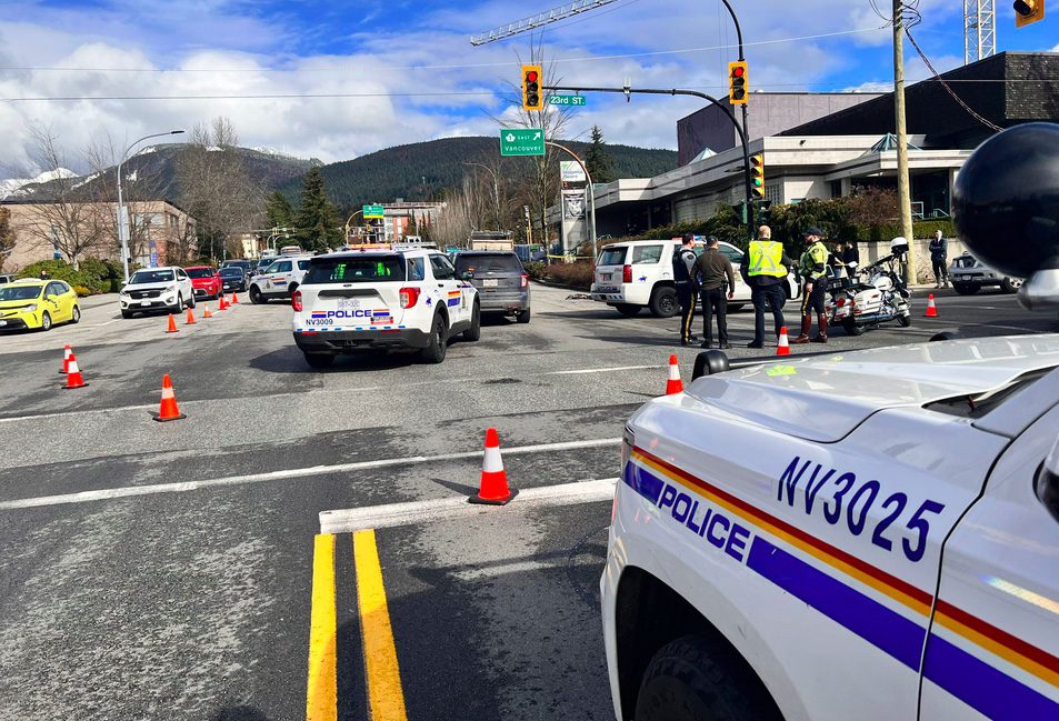 North Vancouver intersection as police attend to cyclist killed by dump truck