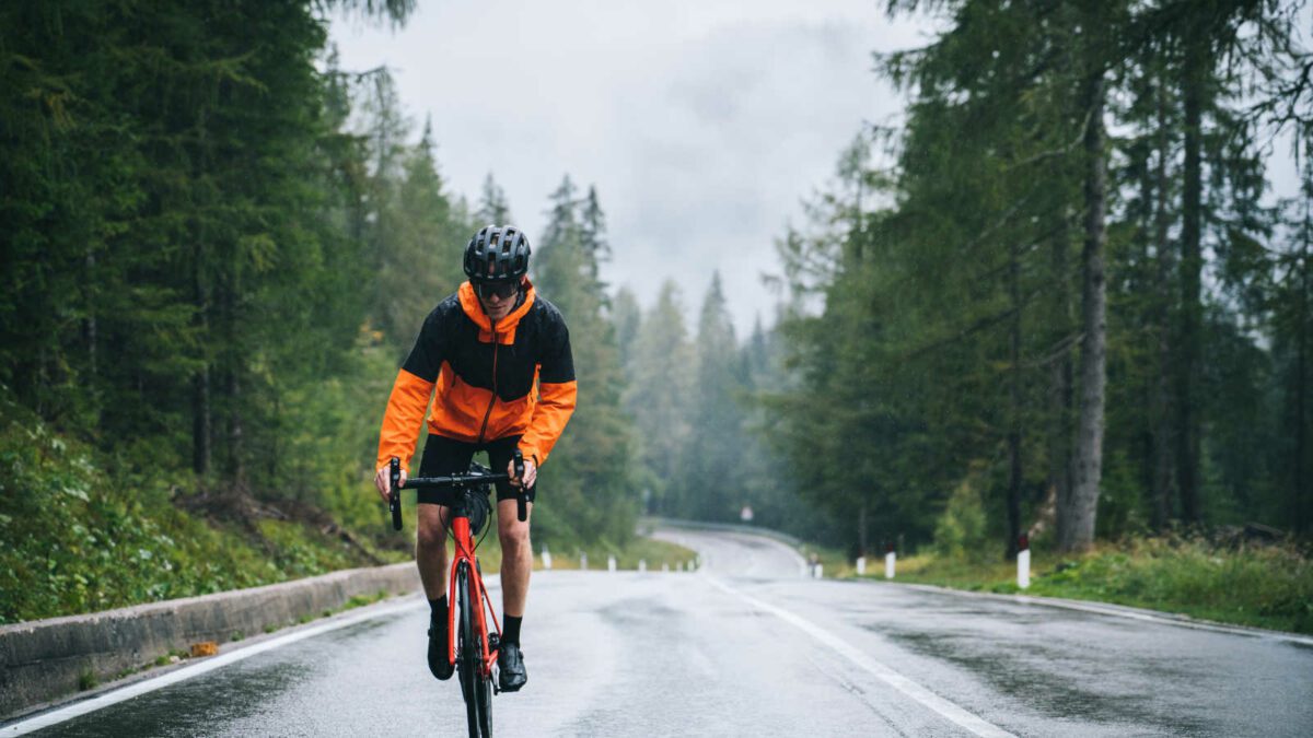 How can cyclists stay safe when they are riding in rainy weather