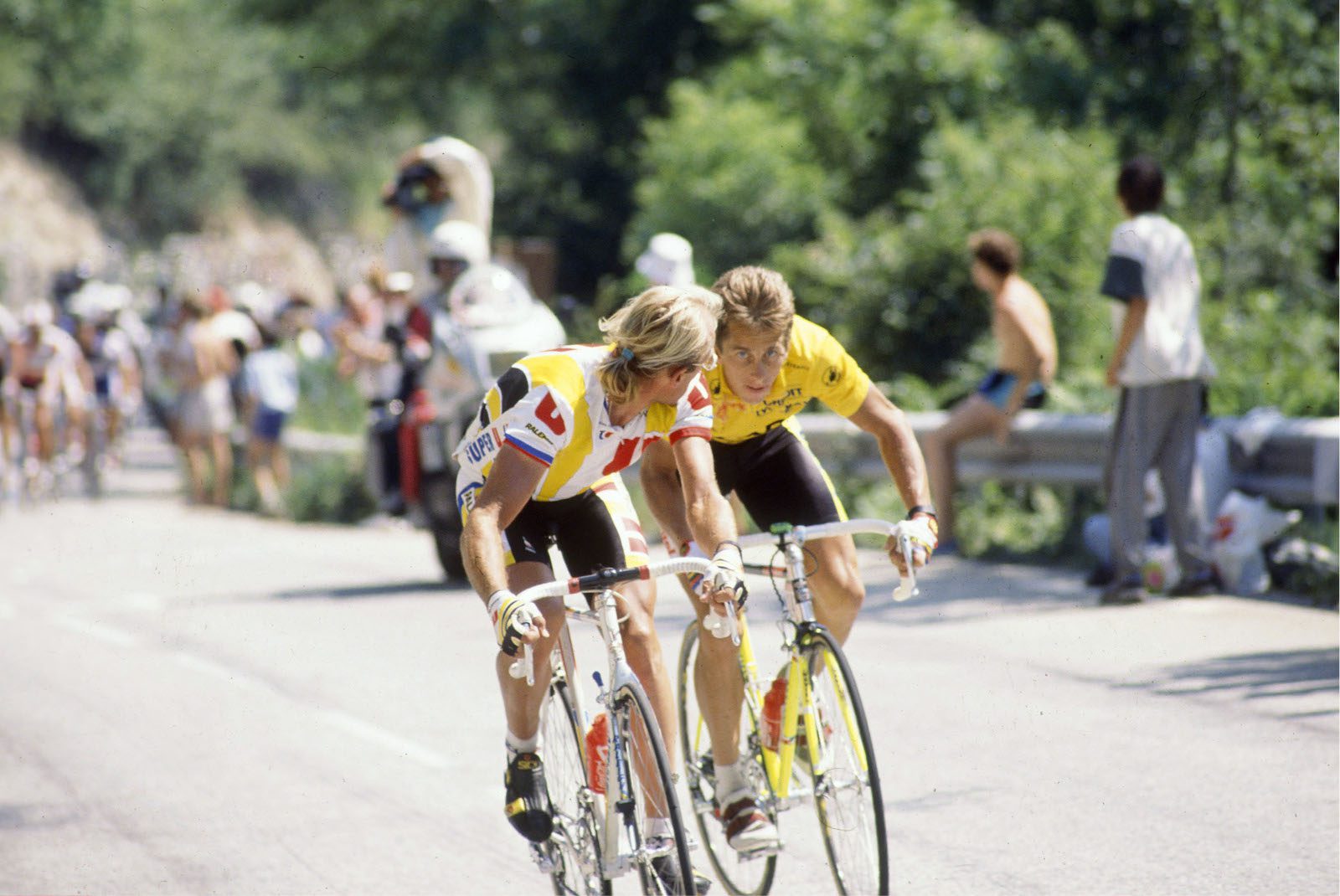 17/7/1989 Tour de France 1989.Stage 16 - Gap to Briancon. Laurent Fignon looks over his shoulder at the chasing Greg LeMond. Photo: Offside / L'Equipe.