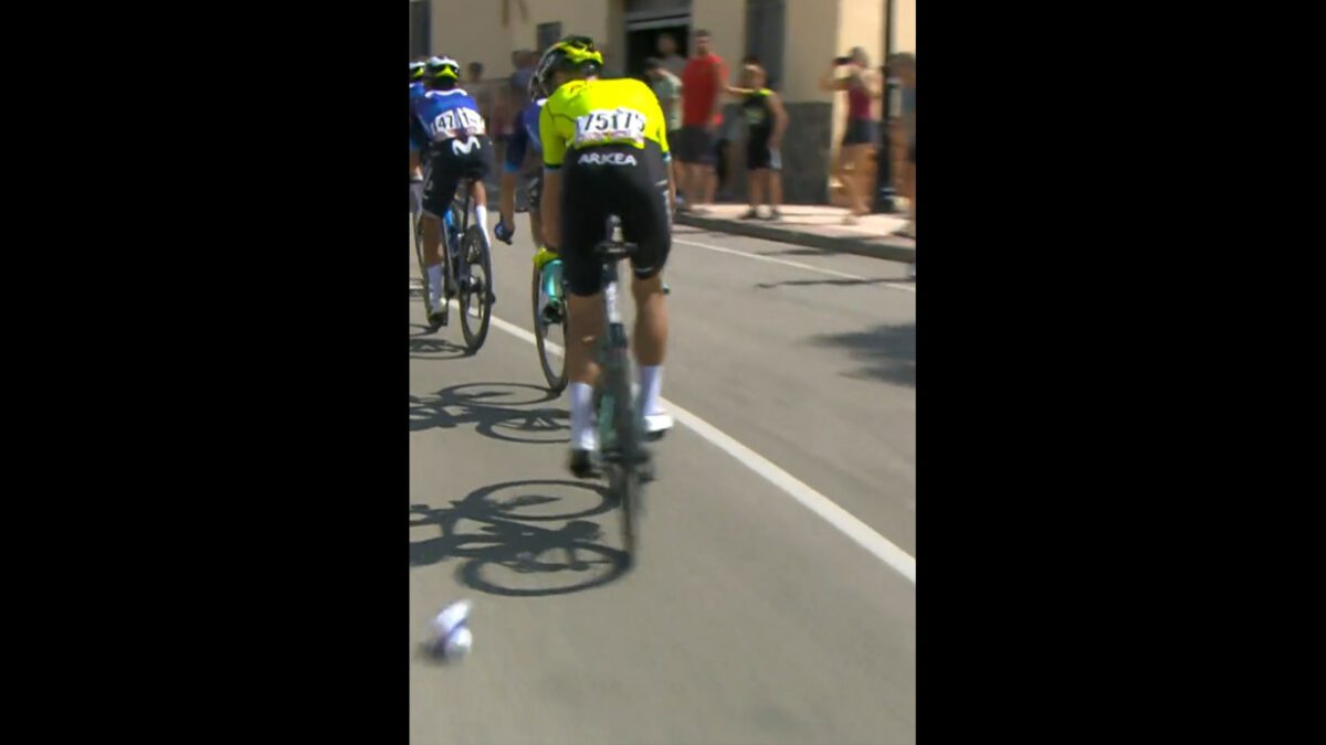 Kevin ledanois knocking a bottle with his bike