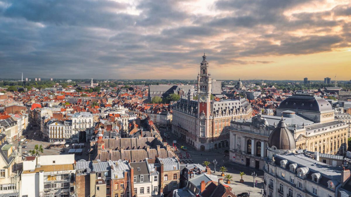 Cityscape of Lille (Hauts-de-france, Flanders, France) at sunset: Aerial skyline view of the historical Grand Place du Général-de-Gaulle, old town main square.
