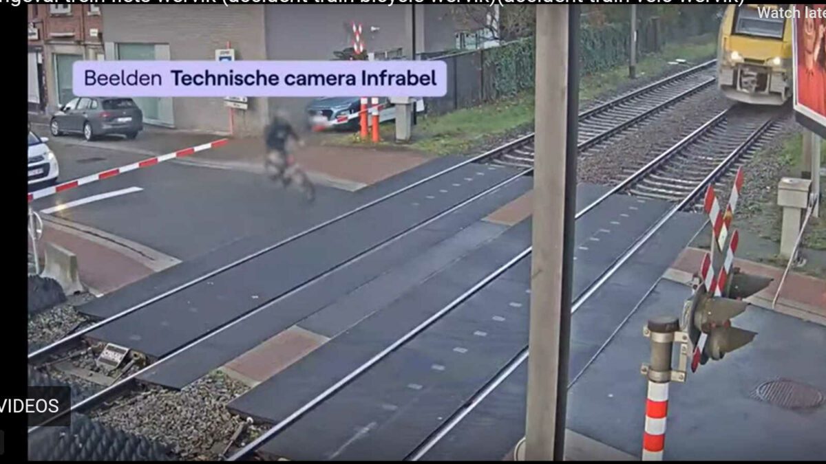 Belgian cyclist skirts death by train