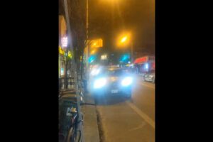 Toronto police officer parked in the bike lane