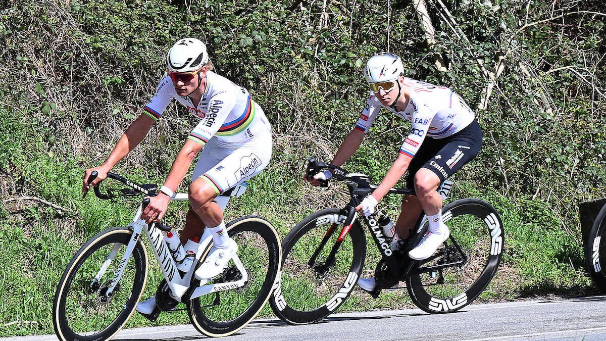 tadej Pogacar follows Mathieu van der Poel during Milan San-Remo 2024
