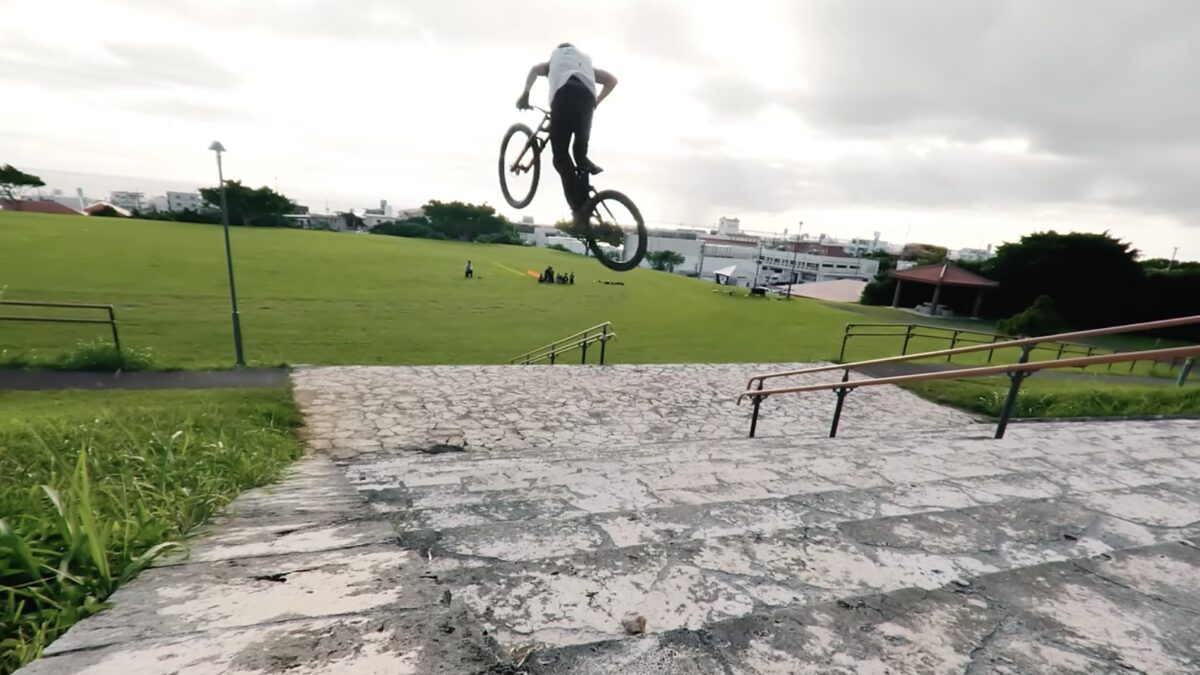 Ayoto Kimura launching down a set of stairs in "Tropical Vibes"